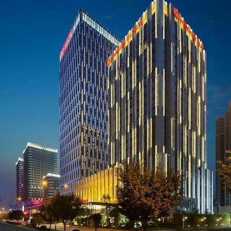 Hotel Wanda Realm Longyan Esterno foto