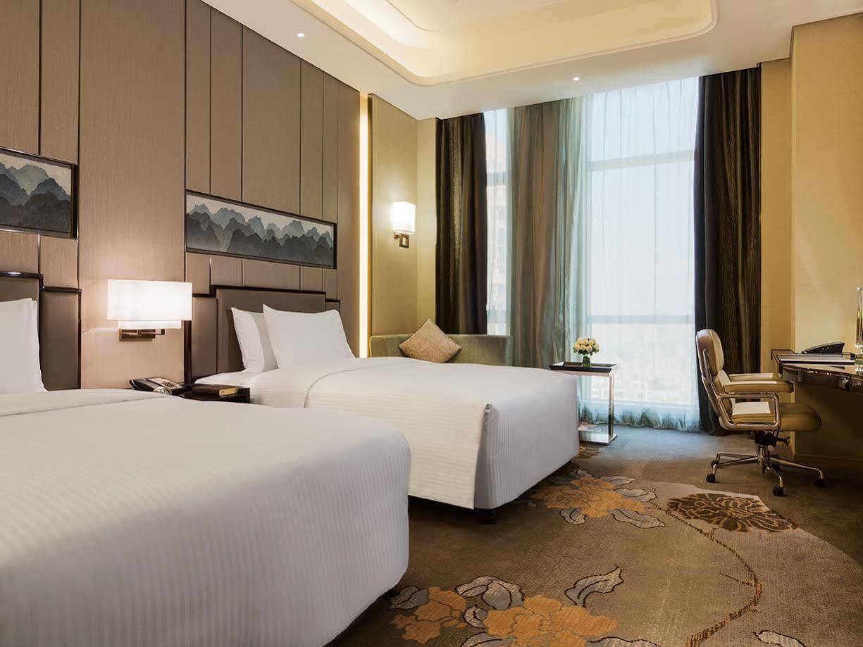 Hotel Wanda Realm Longyan Esterno foto